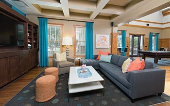 Resident activity center with billiards, media room, and business center